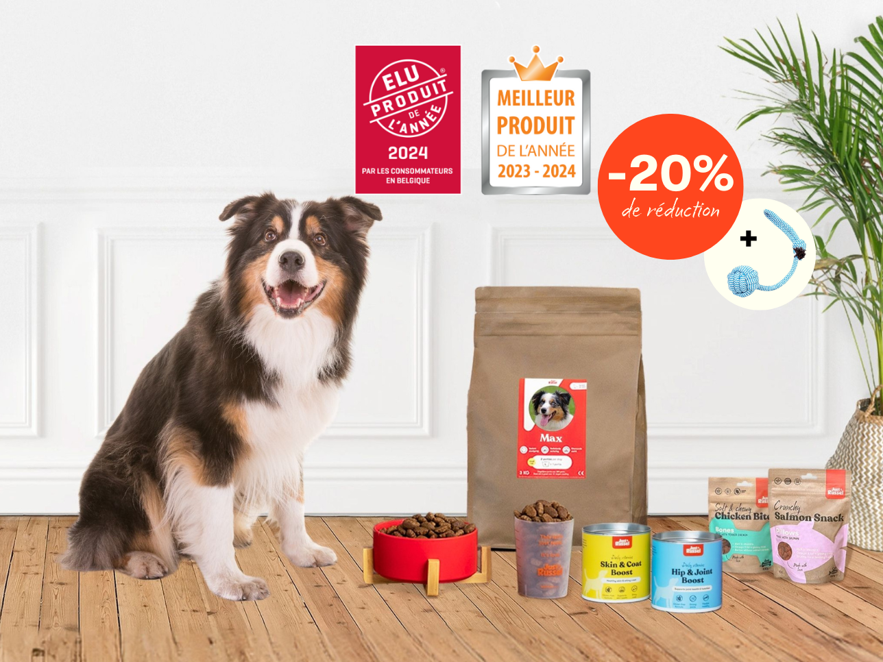 Un chien se tient à côté d'une gamme de produits Just Russel pour présenter une offre de réduction